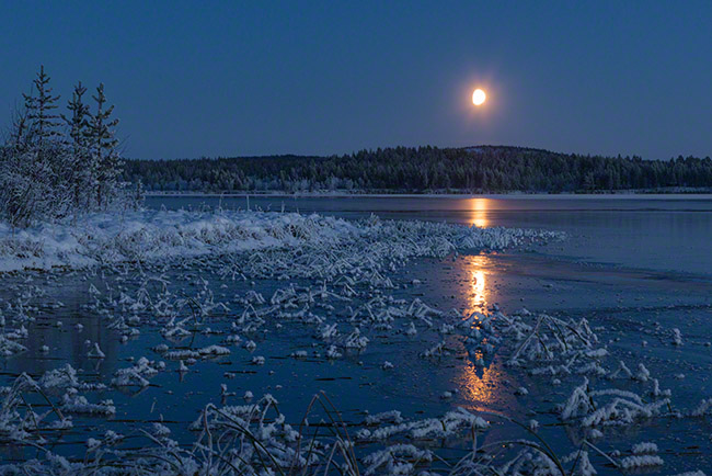 Moonrise above new ice